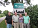 Four of Bruno's kids at the Mirowo town sign